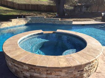 stacked stone pool deck